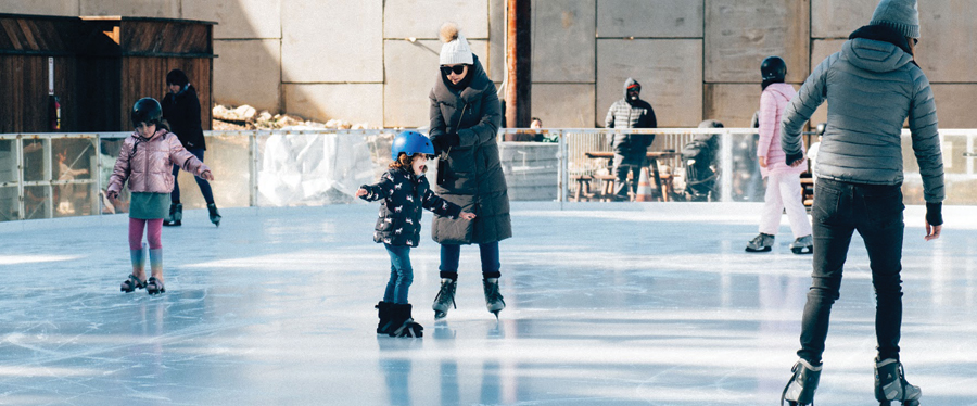 ICE3 Adults and children ice skating.